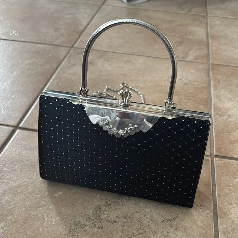 Elegant Black and Silver Clutch with Textured Sparkle